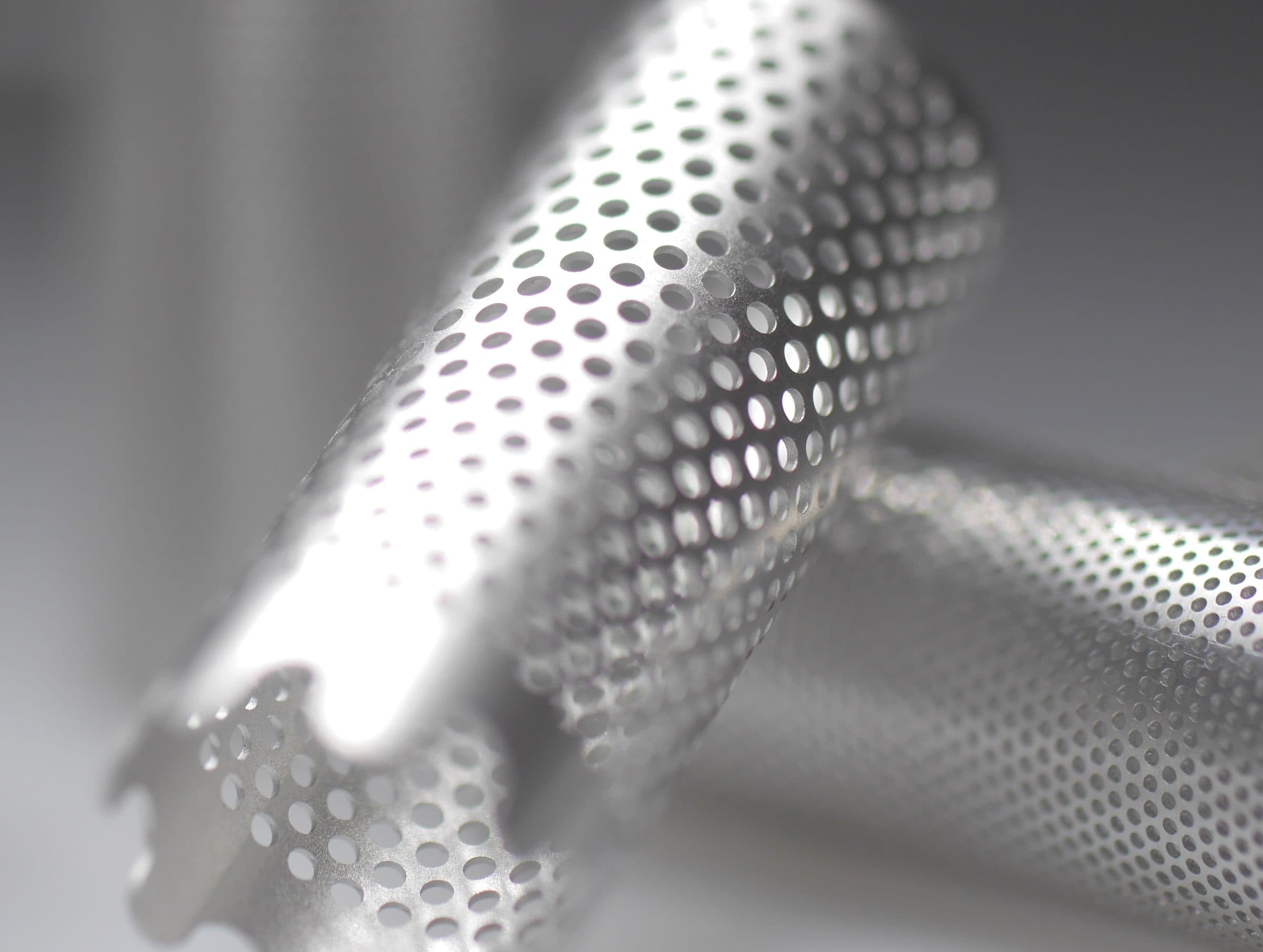Perforated metal tube with micro holes